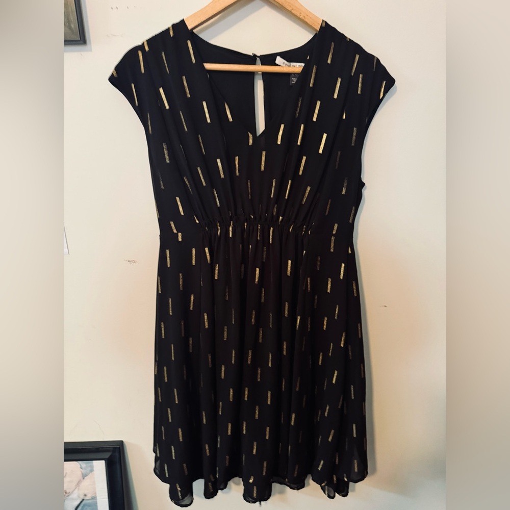 Beautiful summer dress. Sheer slip lining. Rayon blend material. Black with gold